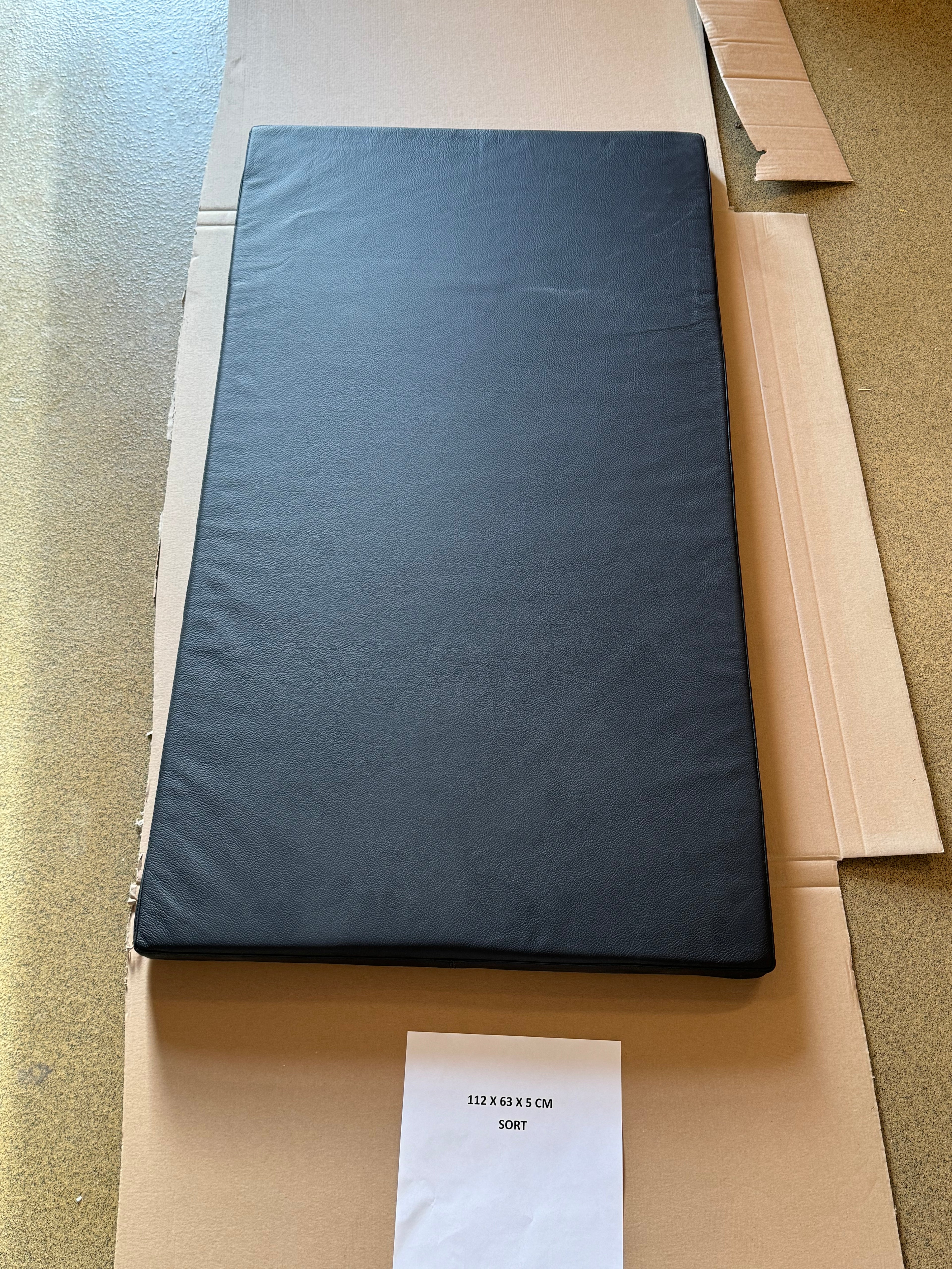 Black leather cushion 112x63x4 cm