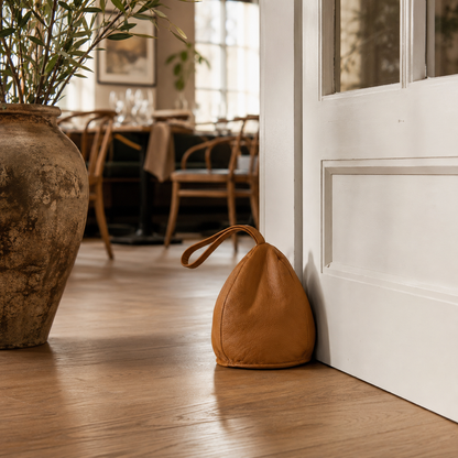 Door stopper in leather - drop-shaped model